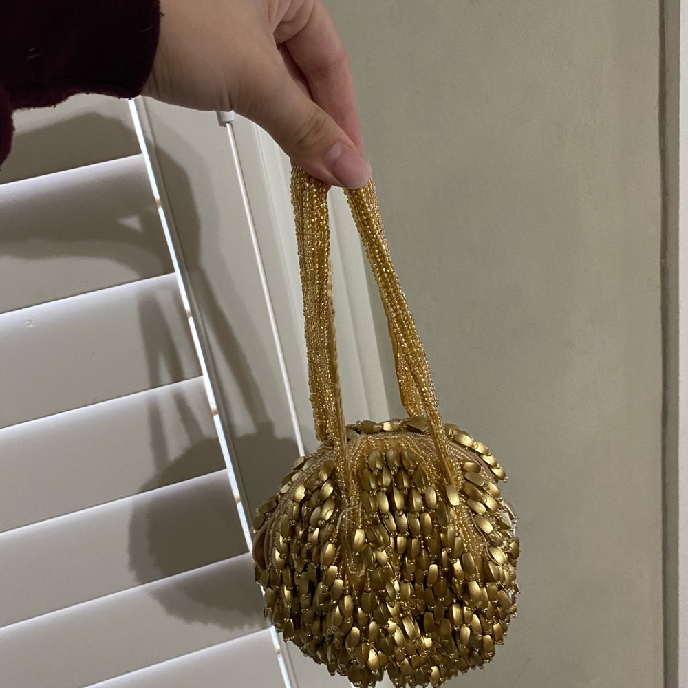 Women’s gold handbag